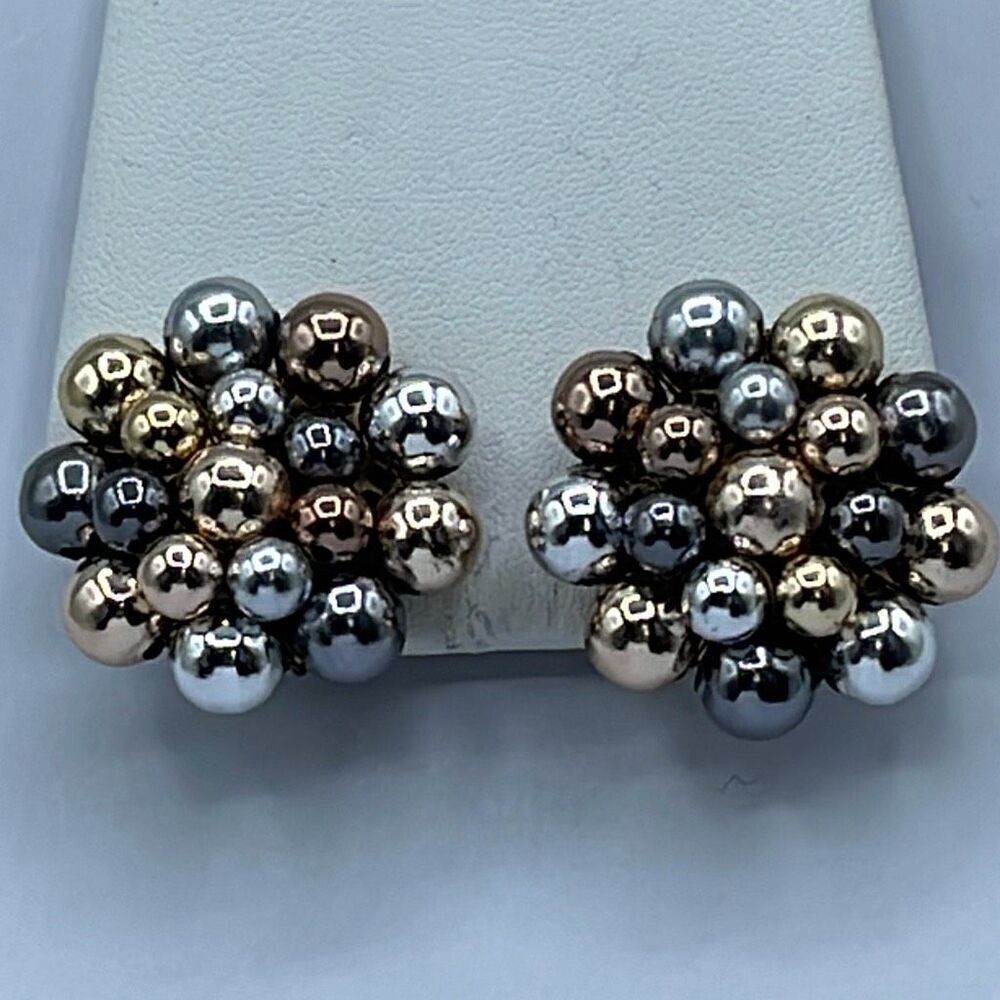 Vintage Vogue mixed metals beaded clip earrings.